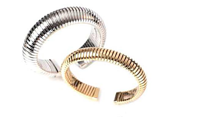 Very basic-style, simple and modern shape, handmade construction. Bracelets tubogas convex form , 18k white, yellow or pink gold. Small, medium or large size.